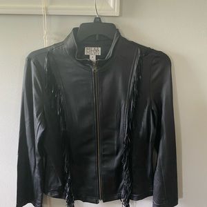 Black leather look(not real leather) jacket. Fringe details